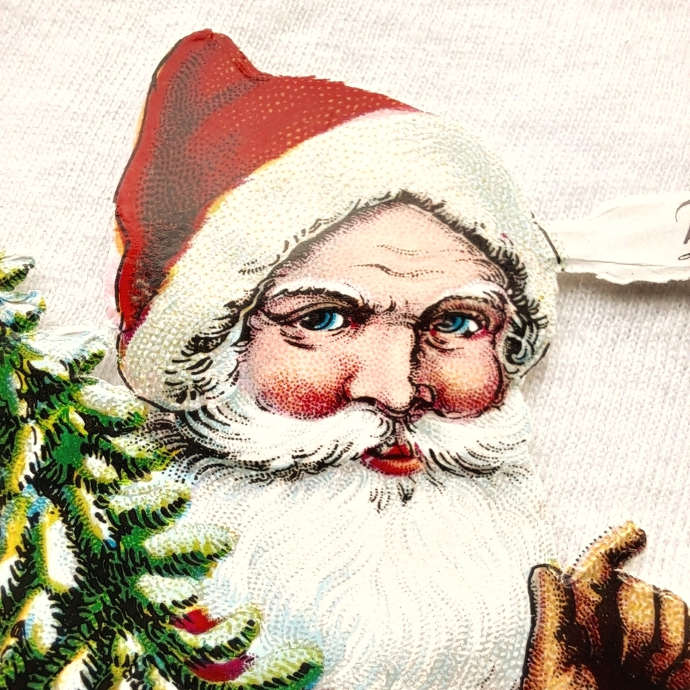 Vintage Santa die-cut scraps.